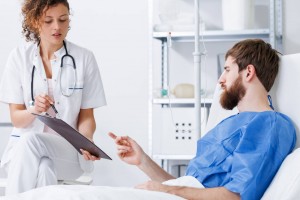 Recovery nurse talking with patient